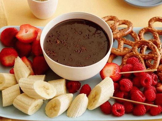 Fotografia felului de mâncare - fondue de ciocolată-portocaliu