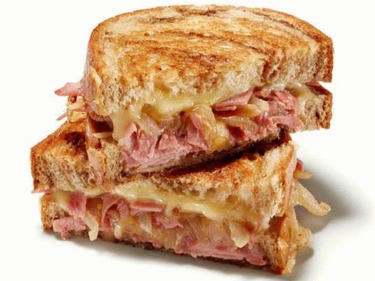 Foto Brânză fierbinte și sandwich corned de vită