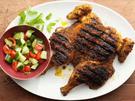 Fotografie de pui la grătar cu curry