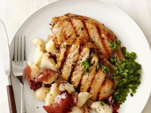 Photo Cutlets de porc natural cu piure de cartofi și sos chimichurri