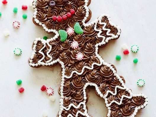 Fotografia omului de turtă făcut din cupcakes