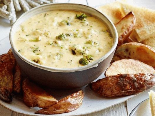 Foto cu baie de brânză cu broccoli și cheddar coapte