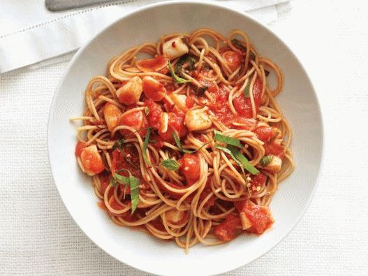 Foto cu Spaghetti și scoici afumate în sos marinara