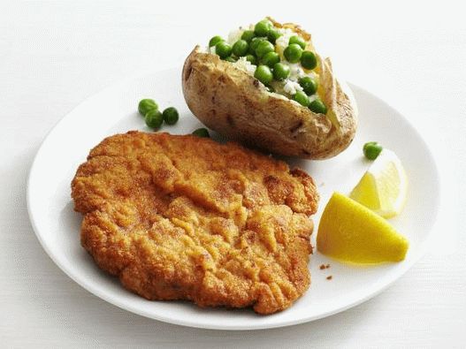 Foto Schnitzel de porc cu cartofi coapte